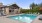 a swimming pool outside a house