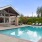 a swimming pool outside a house