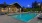 a swimming pool outside a house