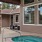 a swimming pool outside a house