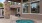 a swimming pool outside a house
