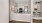 a kitchen with a white counter top