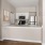 a kitchen with a white counter top