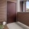 a chair and a door outside a house