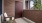 a chair and a door outside a house