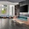 a room with a tv and couches