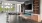 a room with a tv and couches
