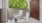 a couple white chairs in a room
